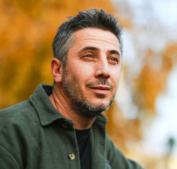 Man in green shirt enjoying nature